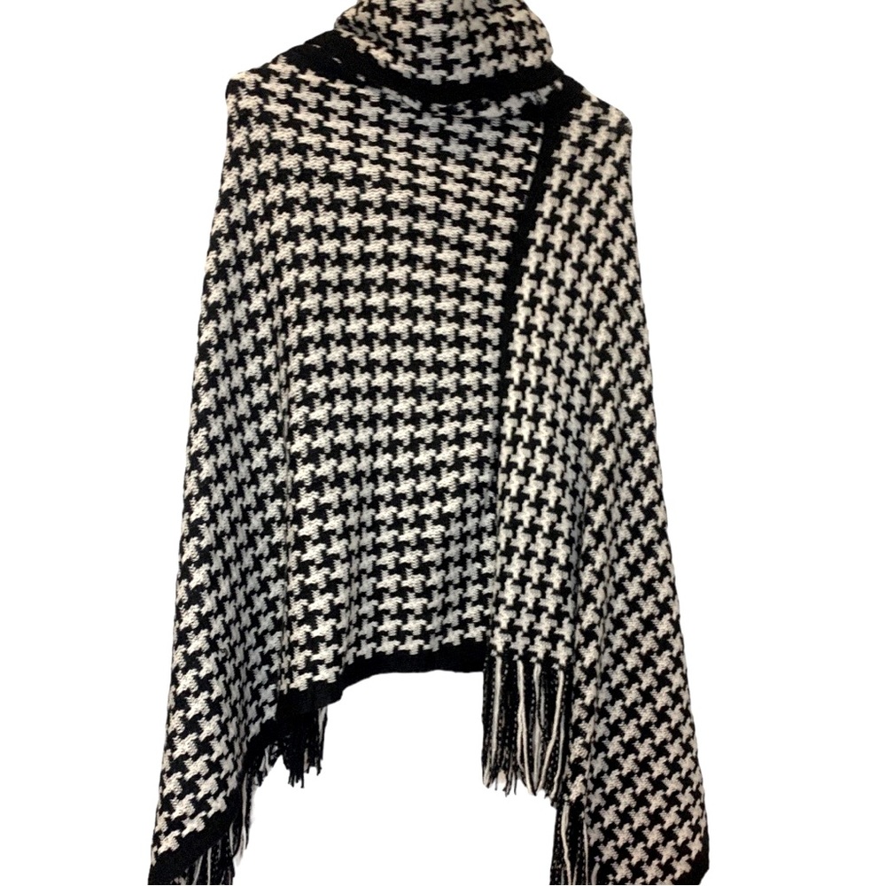 Houndstooth black/white poncho, cowl neck with fringe detail at bottom.  NWOT